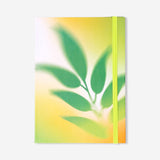 Gradient office notepad with matching pen and sticky notes from Flying Tiger Copenhagen, perfect for organizing notes.
