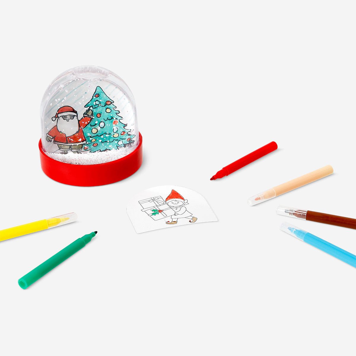 Hobby DIY snowglobe by Flying Tiger Copenhagen featuring a clear glass globe with festive scene inside and a metal base.