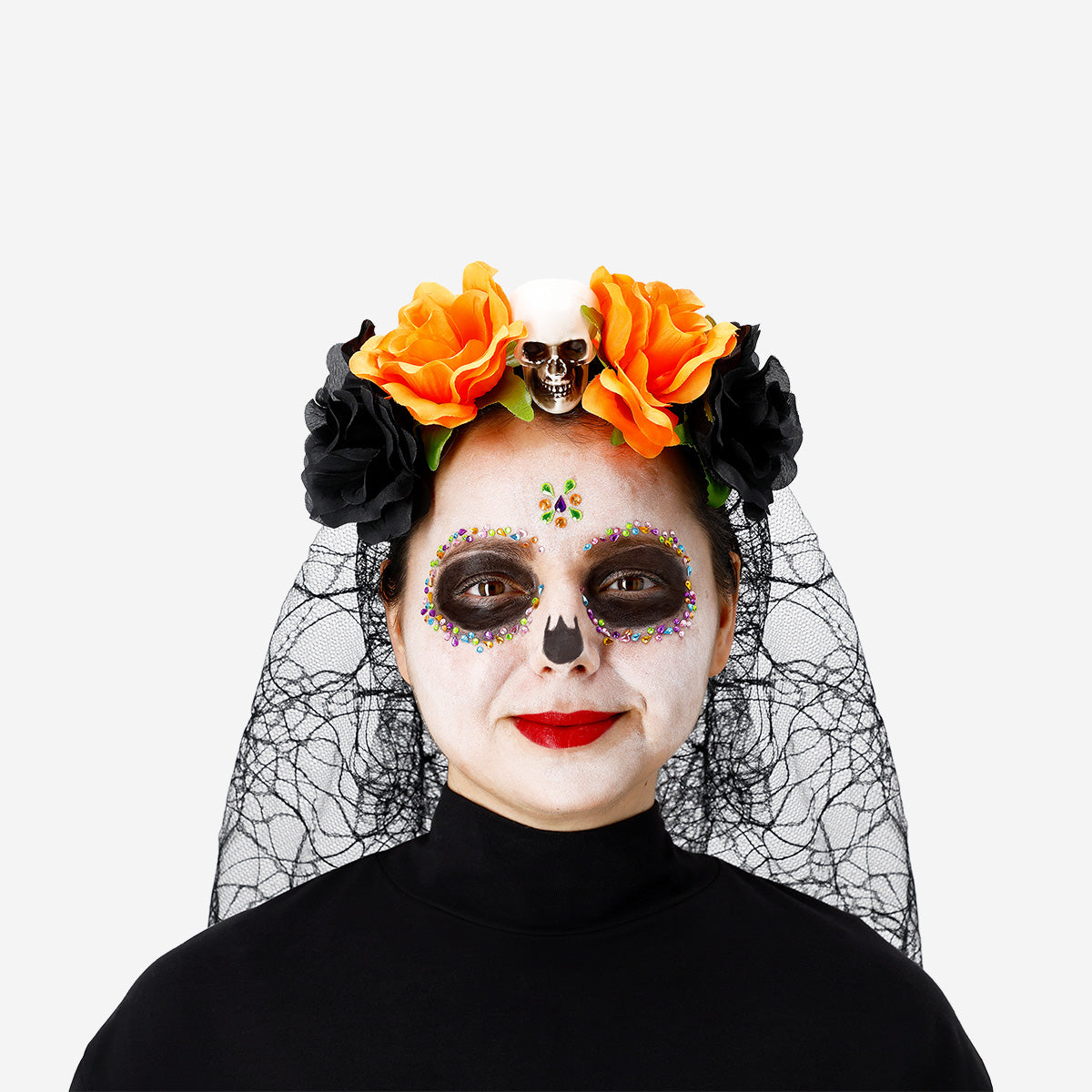 Skull makeup kit with adhesive rhinestones from Flying Tiger Copenhagen, featuring face paint, rhinestones, and makeup accessories.