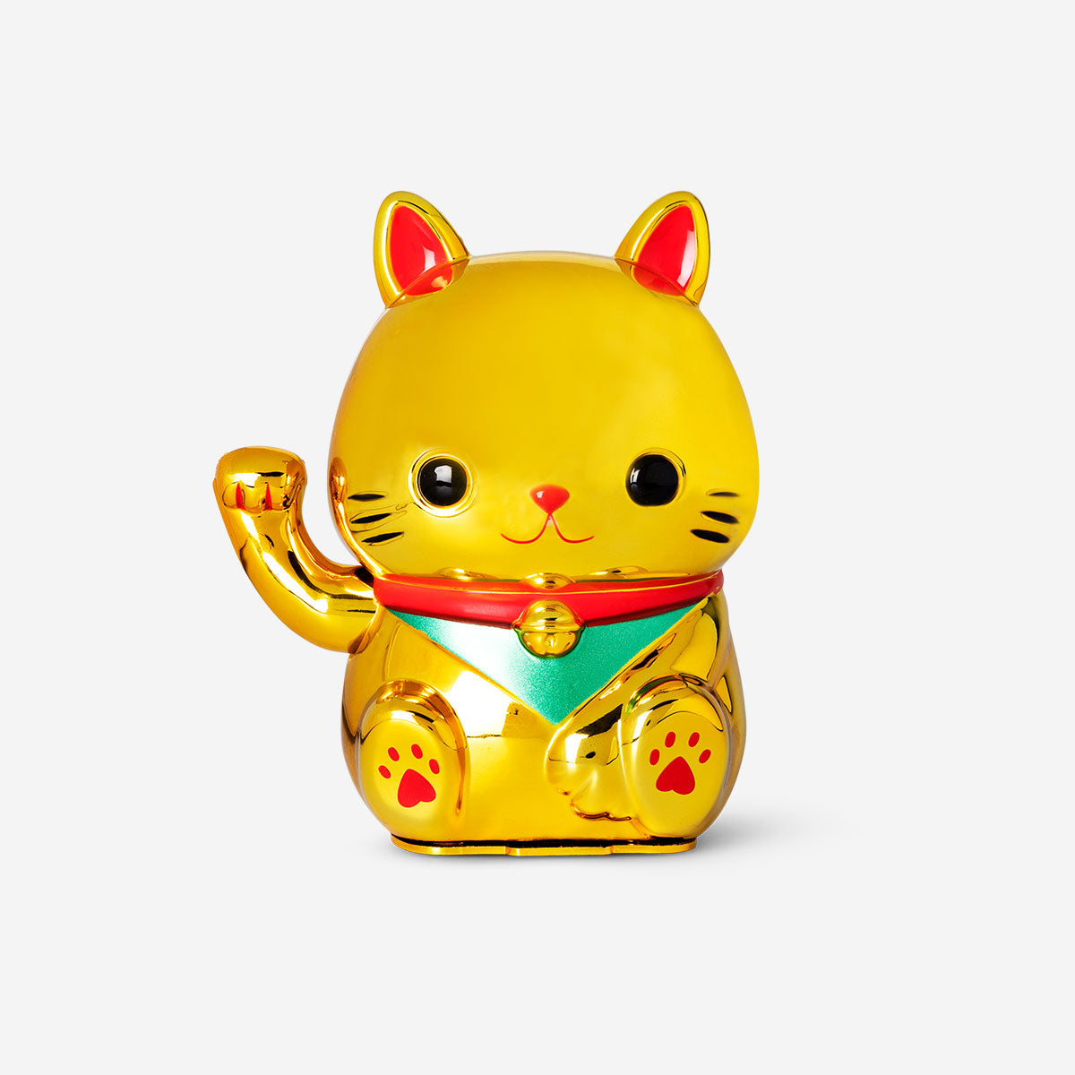 Decorative gold cat-shaped waving gadget by Flying Tiger Copenhagen, featuring a sleek, modern design with a waving tail.