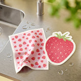 Two strawberry-patterned kitchen cloths from Flying Tiger Copenhagen, soft and absorbent for cleaning and kitchen use.
