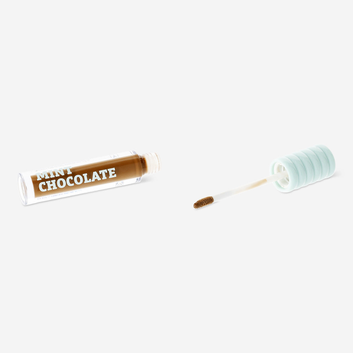Flying Tiger Copenhagen mint chocolate scented lip oil, personal care product with a sleek container and mint chocolate fragrance.