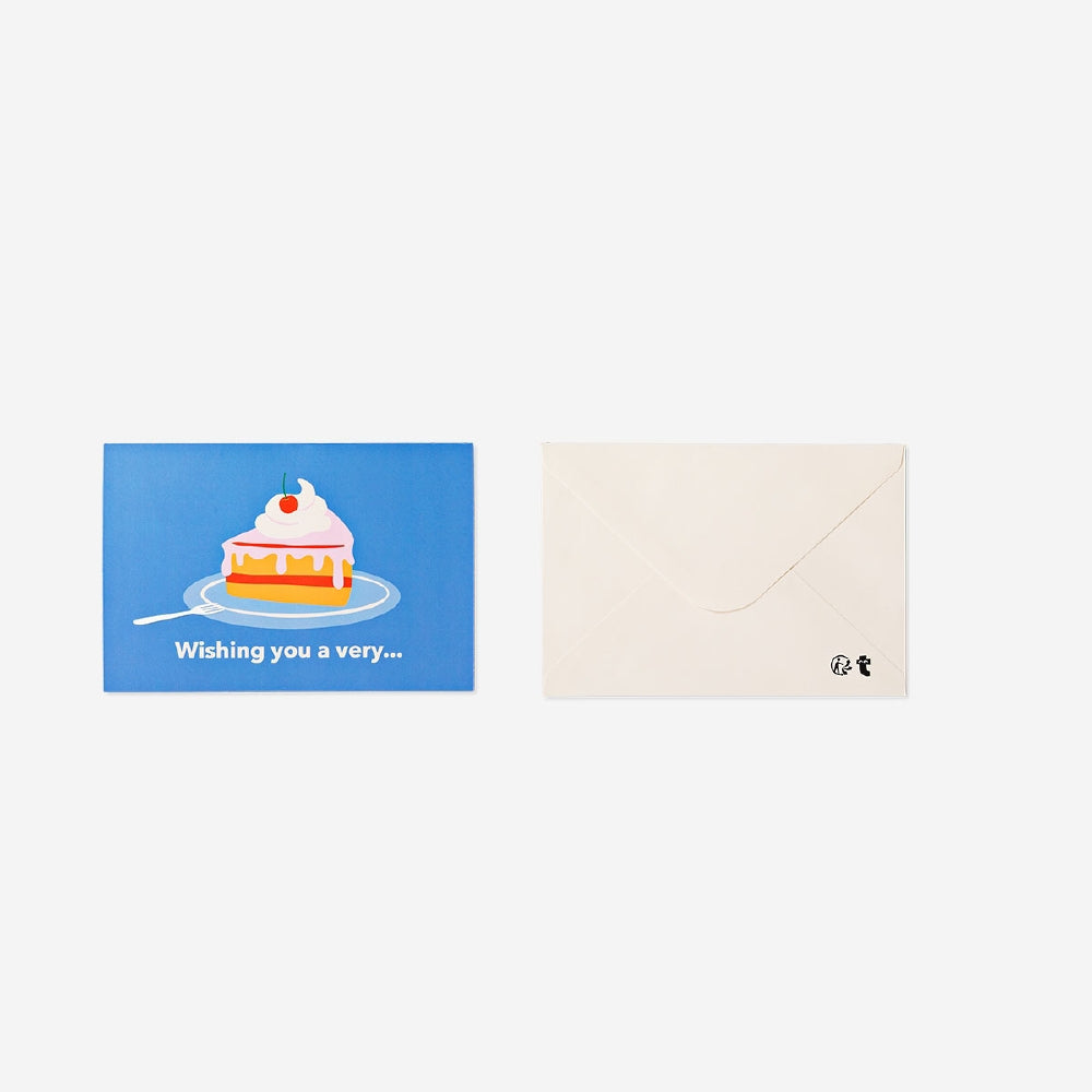 Flying Tiger Copenhagen birthday card featuring a colorful pop-up cake slice design for celebrating special occasions.