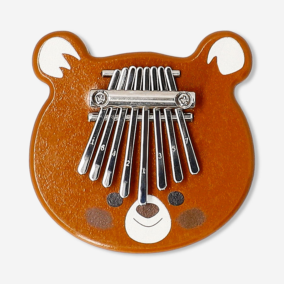 Wooden toy kalimba by Flying Tiger Copenhagen showing its small wooden body and metal tines for musical play.