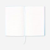 Flying Tiger Copenhagen A5 office notebook with colorful rainbow-edged pages and a durable cover.