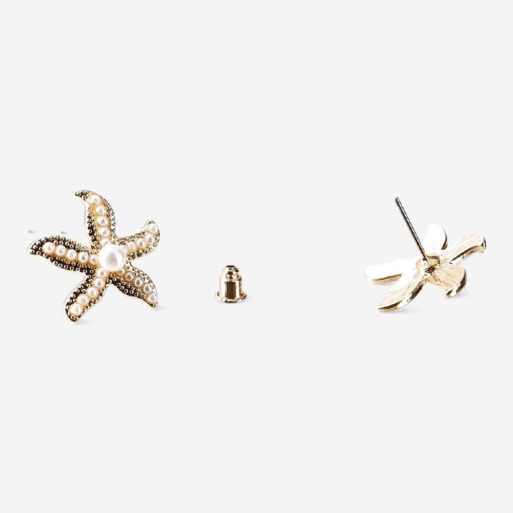 Textile stud earrings featuring seastars with pearl accents, designed by Flying Tiger Copenhagen.