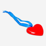 Red ceramic heart hanging ornament for home decor, featuring a smooth finish and a loop for hanging, by Flying Tiger Copenhagen.