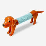 Colorful telescopic sausage dog toy by Flying Tiger Copenhagen, expandable plush dog with a playful, elongated design.