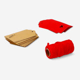 Office gift decoration set in red with festive paper and embellishments by Flying Tiger Copenhagen for holiday or gift wrapping.