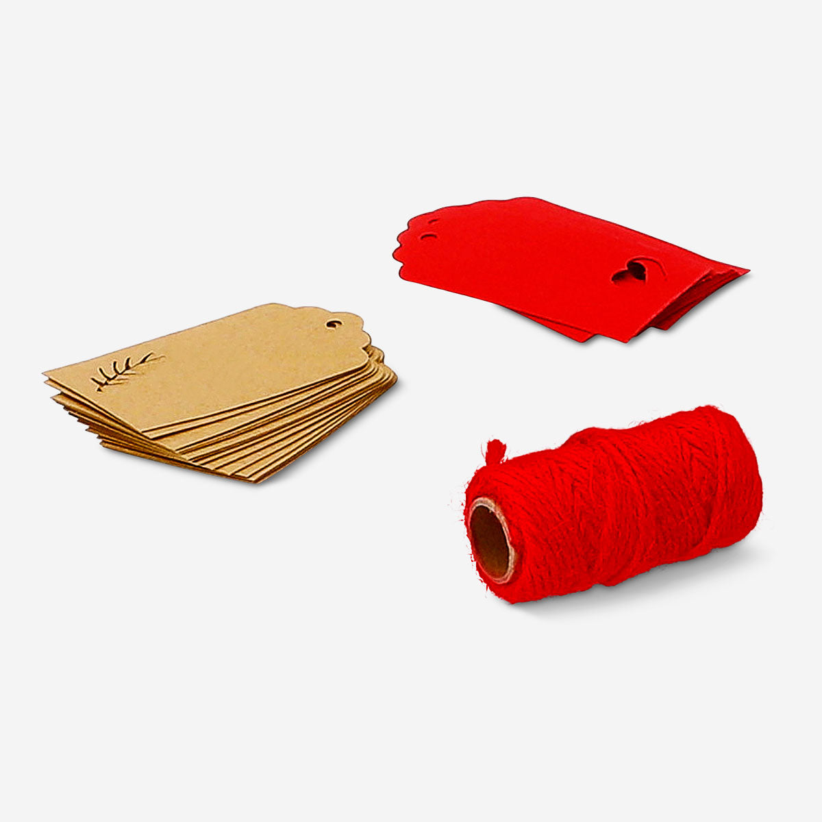 Office gift decoration set in red with festive paper and embellishments by Flying Tiger Copenhagen for holiday or gift wrapping.