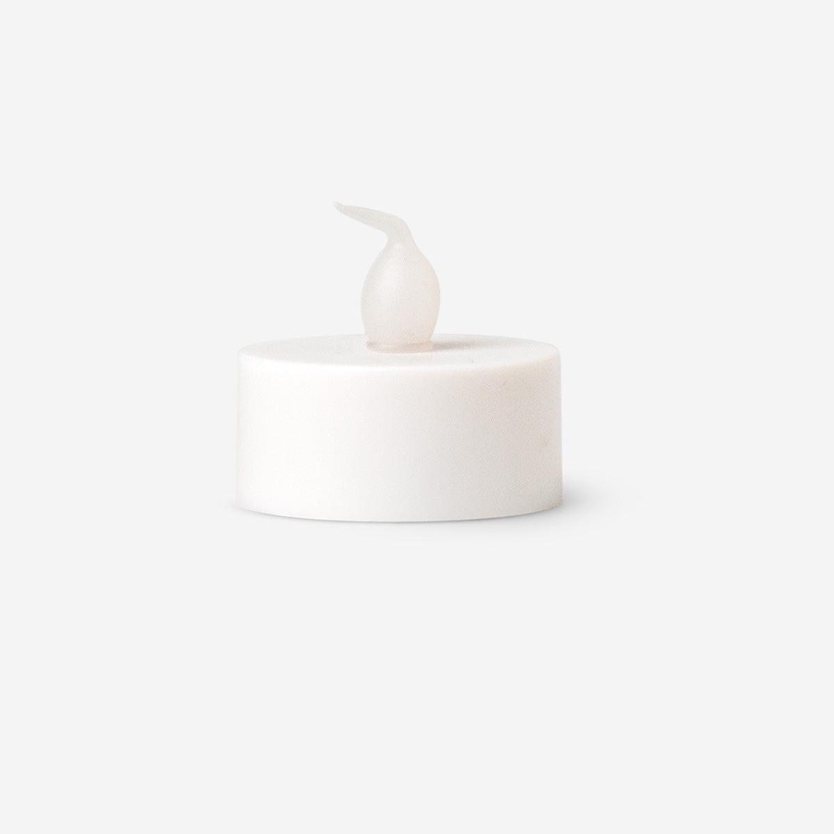 Set of four white LED tealights for home decor by Flying Tiger Copenhagen, ideal for cozy ambient lighting.