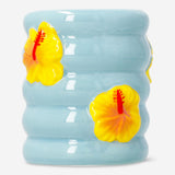 Ceramic tooth mug with hibiscus flower print, ideal for home use, featuring vibrant floral design from Flying Tiger Copenhagen.