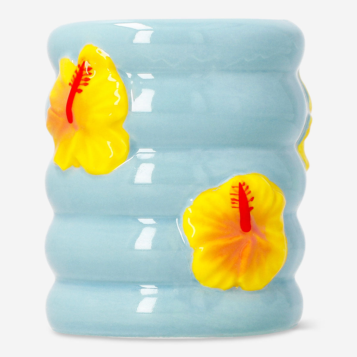 Ceramic tooth mug with hibiscus flower print, ideal for home use, featuring vibrant floral design from Flying Tiger Copenhagen.