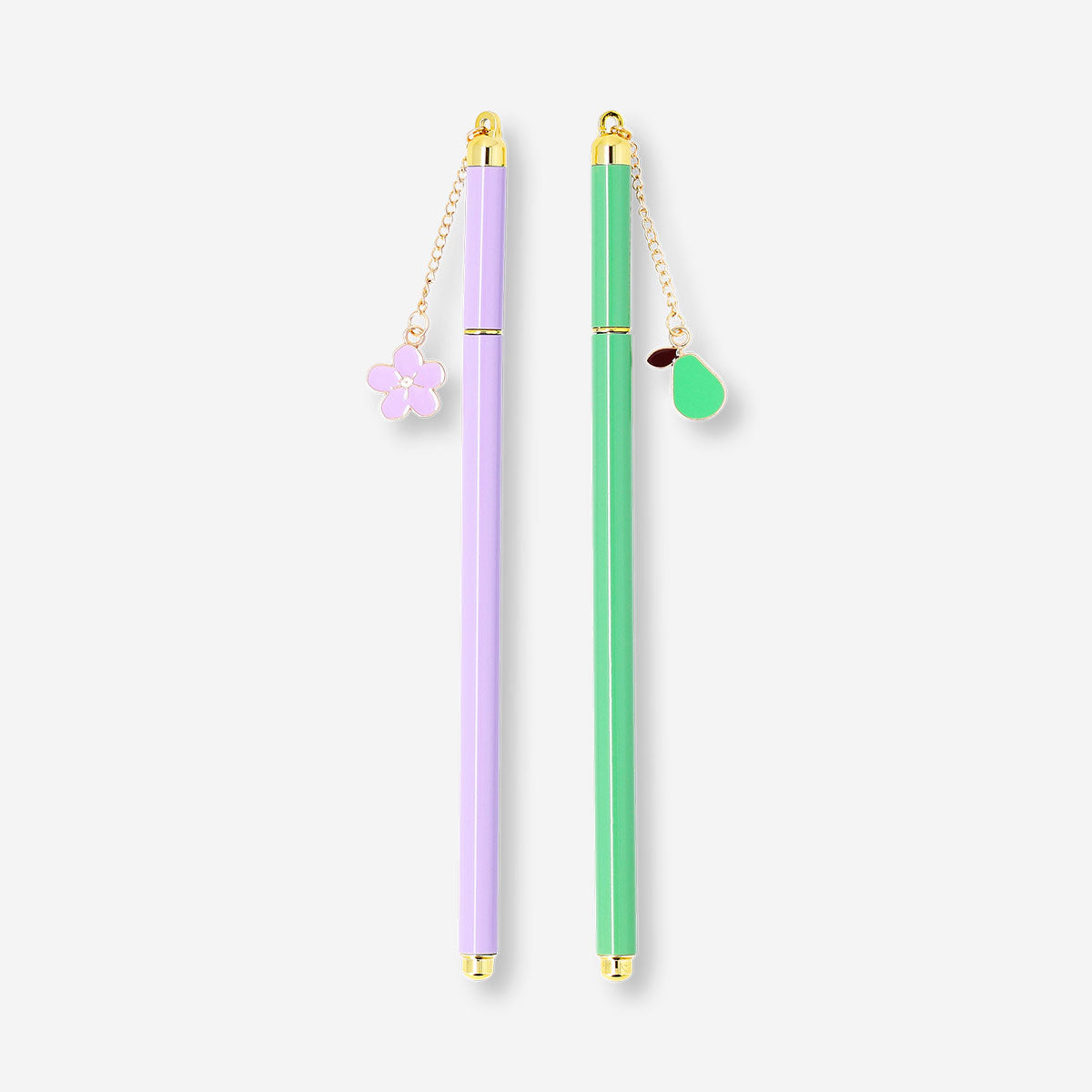 Pair of Flying Tiger Copenhagen office ballpoint pens with decorative charms, featuring colorful designs and ergonomic grips.