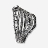 Textile skeleton hair clip by Flying Tiger Copenhagen featuring a detailed skeleton design for stylish hair accessories.