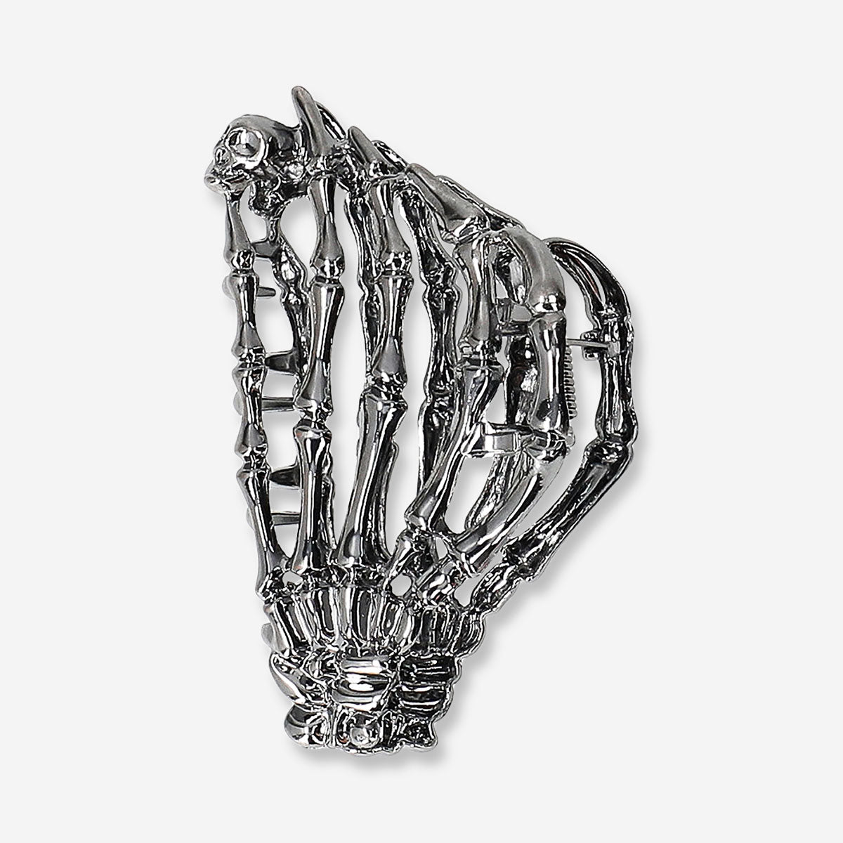 Textile skeleton hair clip by Flying Tiger Copenhagen featuring a detailed skeleton design for stylish hair accessories.