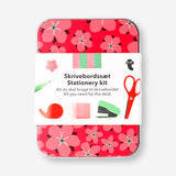 Red floral box stationery kit with pens, pencils, and office supplies from Flying Tiger Copenhagen.