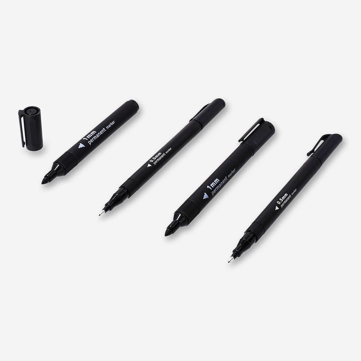 Set of four black permanent markers from Flying Tiger Copenhagen, ideal for office writing and labeling tasks.
