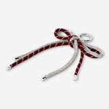 Glitter bow textile keyring from Flying Tiger Copenhagen with a shiny, decorative bow design.