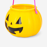 Orange pumpkin-shaped Trick or Treat bucket for Halloween parties by Flying Tiger Copenhagen, perfect for collecting treats