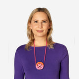 Flower fan gadget with neck strap from Flying Tiger Copenhagen, showing colorful flower design and adjustable strap.