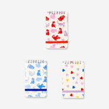 Set of three spiralbound office notepads with playful cat print by Flying Tiger Copenhagen, ideal for note-taking and organization.