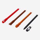 Set of four erasable office pens with festive Christmas toppers from Flying Tiger Copenhagen, ideal for holiday writing and gifting.