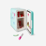 Flying Tiger Copenhagen cosmetics mini fridge with mirror, light, and stickers, measuring 25x25 cm for personal care storage.