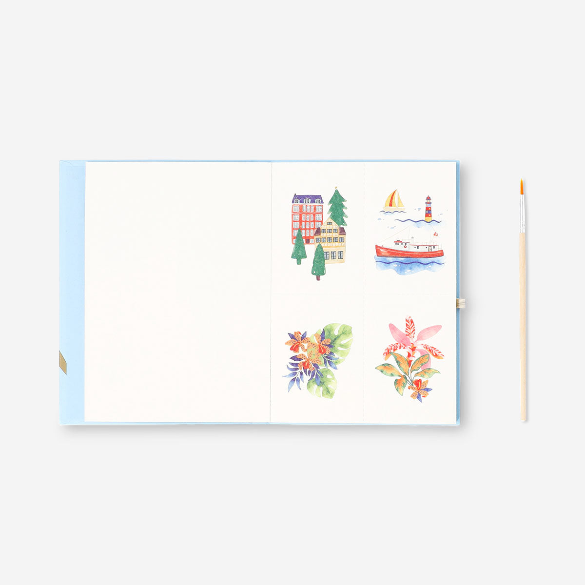 Flying Tiger Copenhagen watercolouring book with paint and brush for hobby art projects, featuring colorful pages and creative tools.