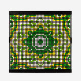 Colorful DIY beaded figure made with ironing beads, hobby craft by Flying Tiger Copenhagen, featuring intricate bead designs on a white background.