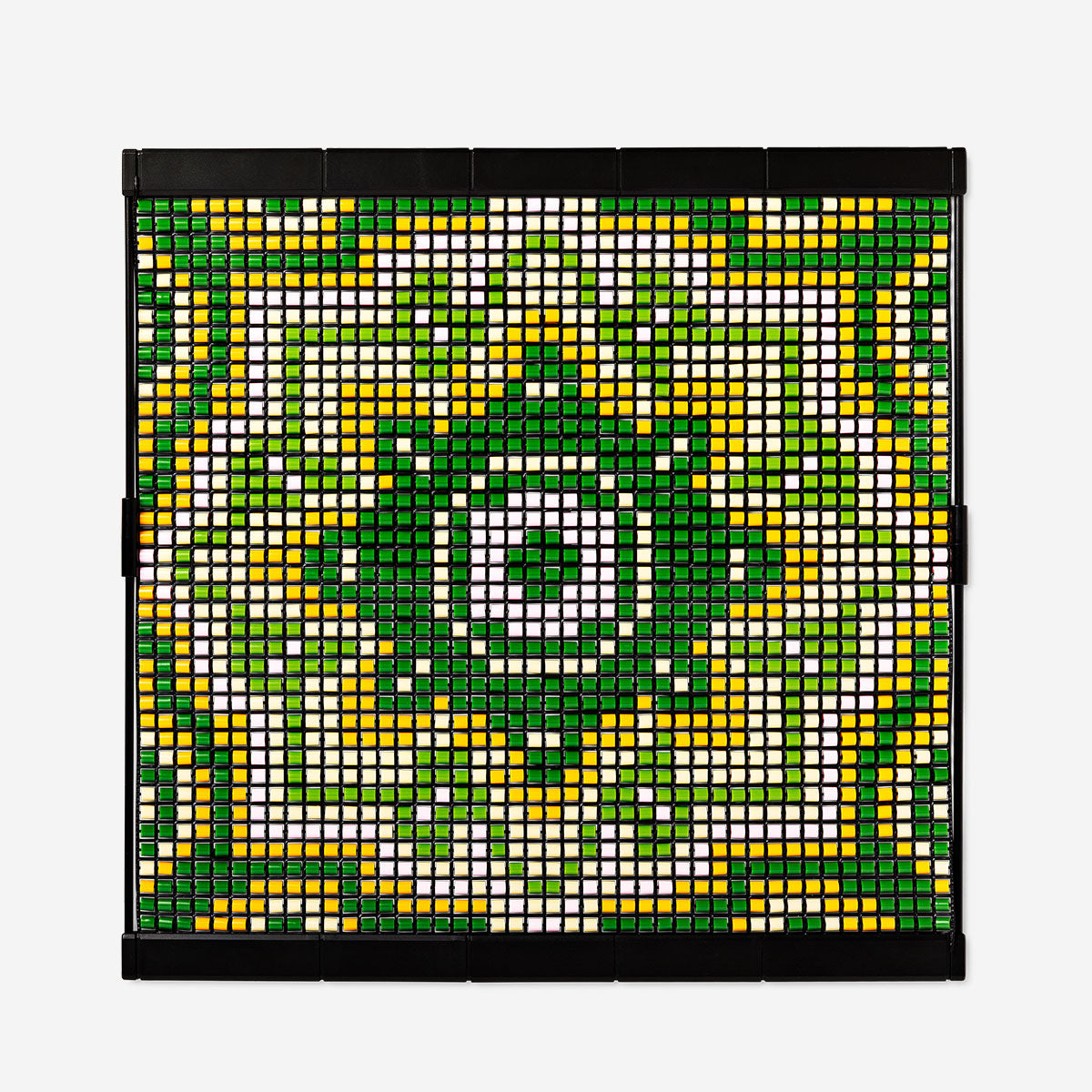 Colorful DIY beaded figure made with ironing beads, hobby craft by Flying Tiger Copenhagen, featuring intricate bead designs on a white background.