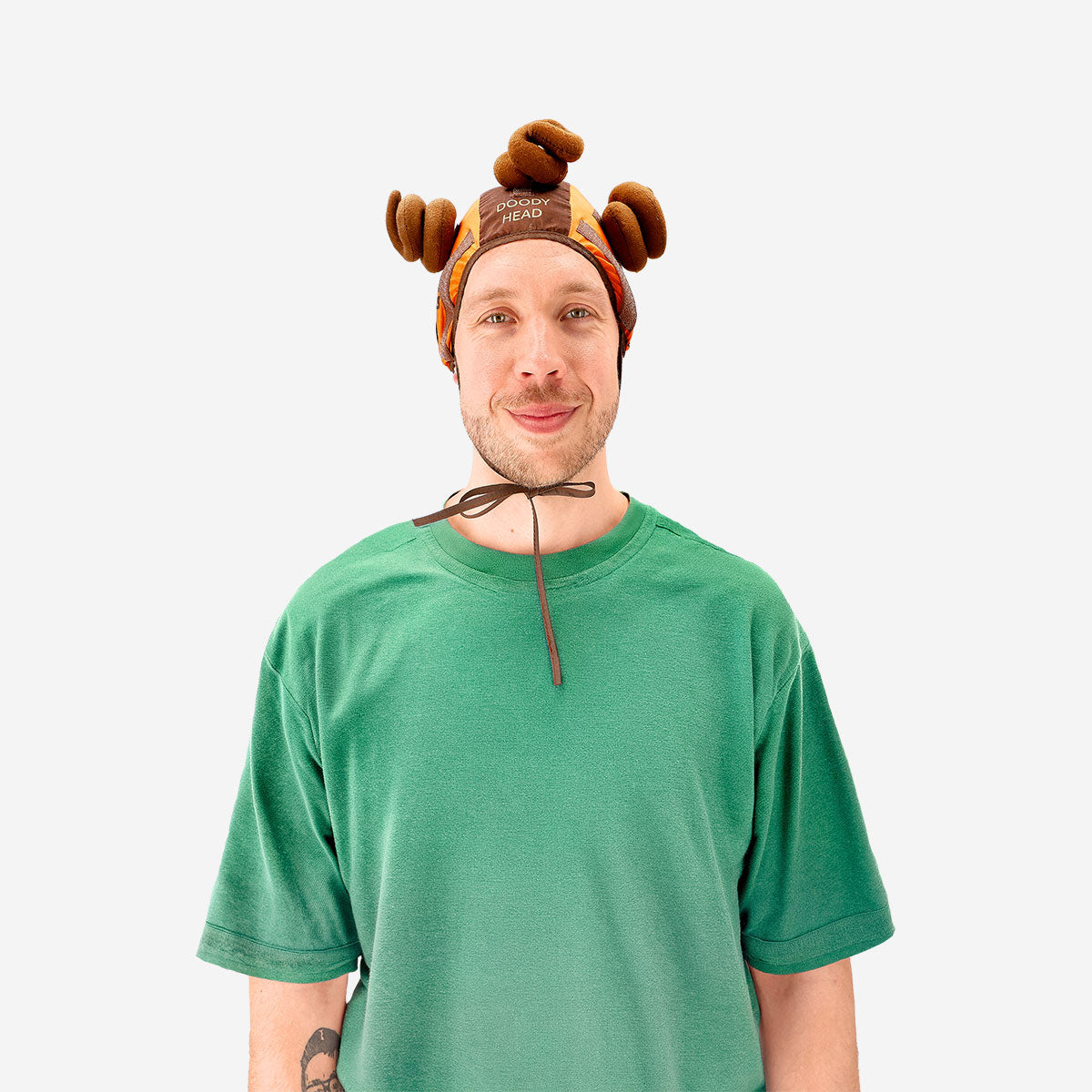Flying Tiger Copenhagen Pinhead Poo Game gadget featuring a colorful, playful design with a pinhead character and game elements.