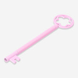 Pink key-shaped ballpoint pen from Flying Tiger Copenhagen, designed for office use, with a colorful and playful key shape.