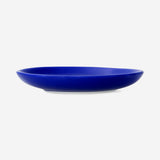 Blue ceramic kitchen plate with playful cat design, 23 cm, by Flying Tiger Copenhagen, ideal for serving food or display.