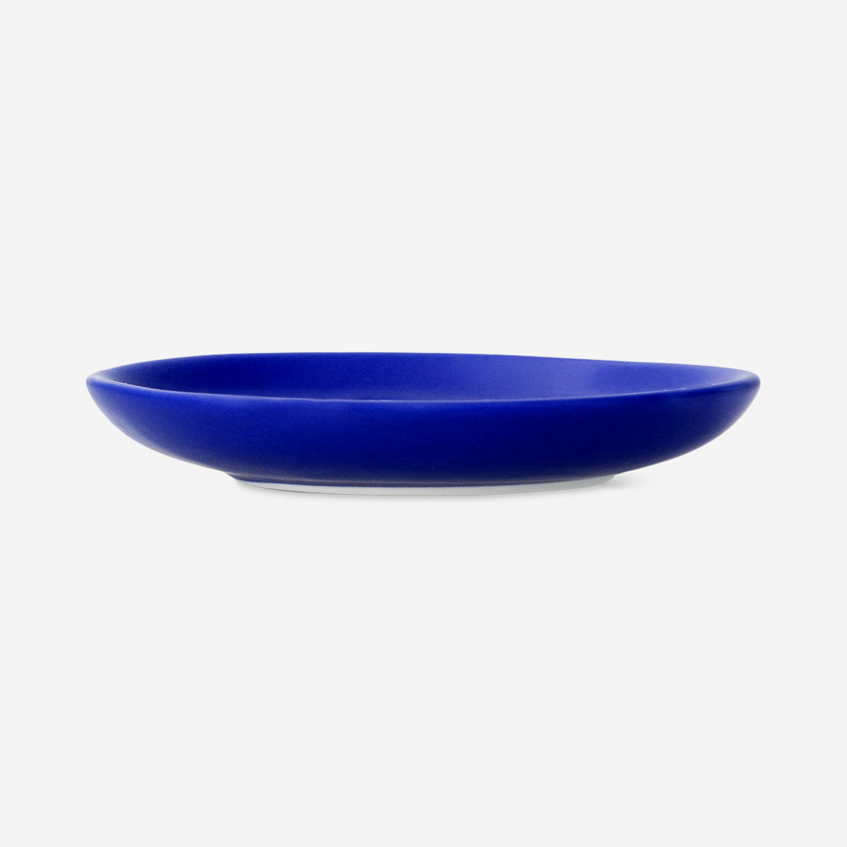Blue ceramic kitchen plate with playful cat design, 23 cm, by Flying Tiger Copenhagen, ideal for serving food or display.
