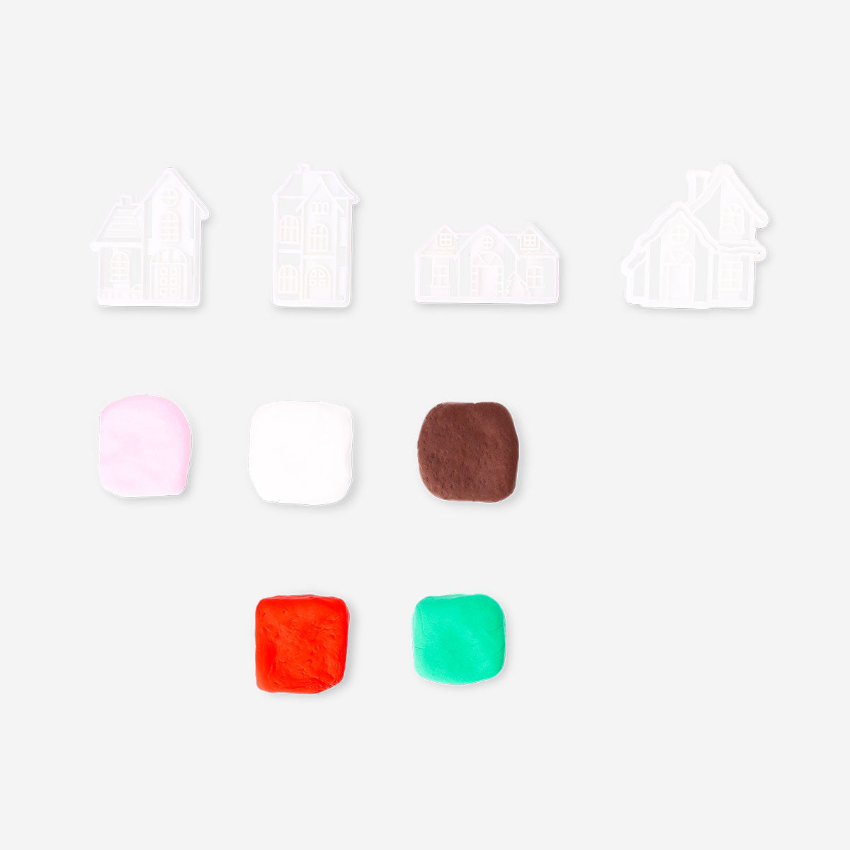 Light clay set for making gingerbread houses, hobby craft kit by Flying Tiger Copenhagen with colorful clay pieces and decorating tools.