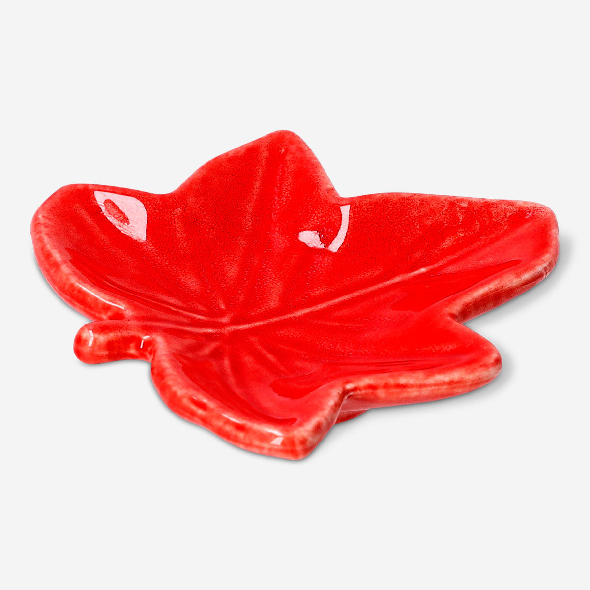 Autumn leaf trinket tray by Flying Tiger Copenhagen, decorated with fall leaf patterns for home organization.