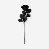 Black decorative flower resembling a rose, ideal for home decor, by Flying Tiger Copenhagen.