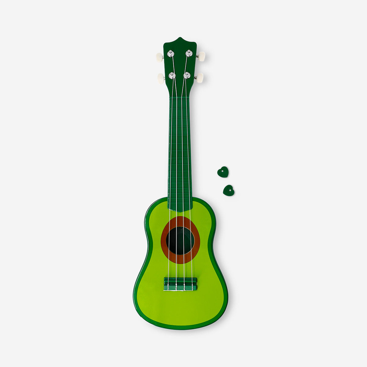 Flying Tiger Copenhagen avocado-shaped ukulele gadget with green body and four strings, designed for fun music play.
