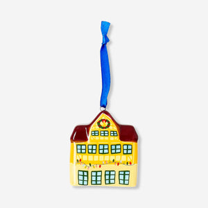 Yellow ceramic house hanging ornament, decorative home decor piece by Flying Tiger Copenhagen.