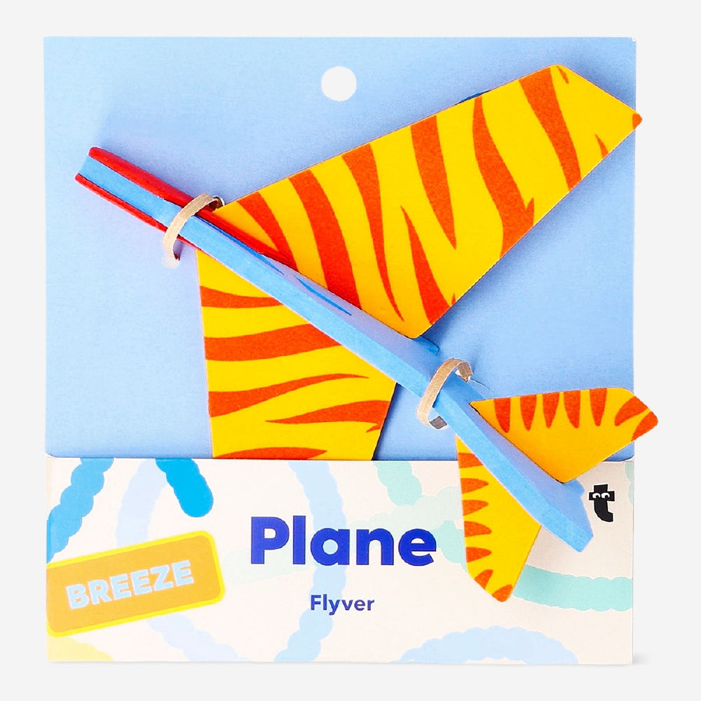 Mini glider plane toy from Flying Tiger Copenhagen, lightweight plastic aircraft with colorful wings for outdoor play.