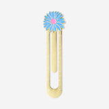 Gold metal office ruler with a decorative flower design from Flying Tiger Copenhagen on a white background.
