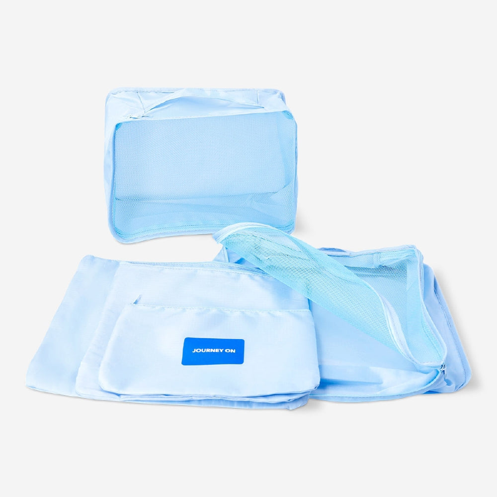 Set of five blue leisure organiser bags by Flying Tiger Copenhagen, compact storage with zip closures for travel and organization.