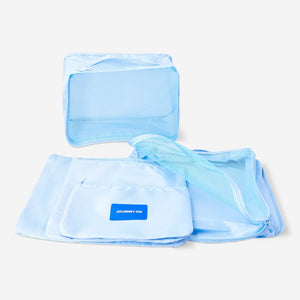 Set of five blue leisure organiser bags by Flying Tiger Copenhagen, showcasing compact storage and versatile travel accessories.
