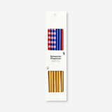 Colorful wooden chopsticks set with four pieces from Flying Tiger Copenhagen, ideal for kitchen use and Asian cuisine.
