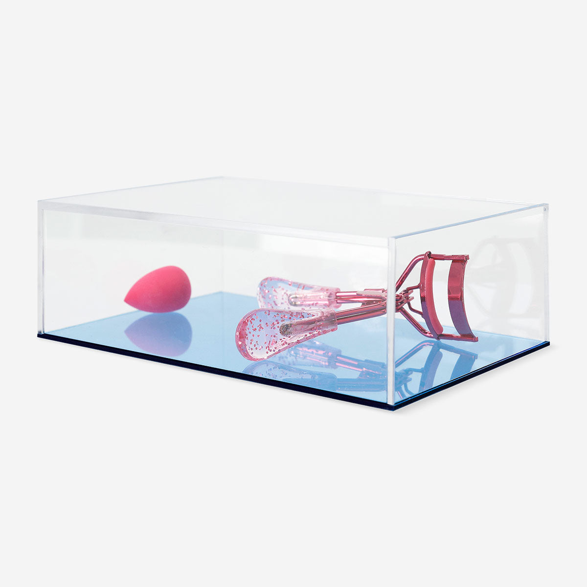 Flying Tiger Copenhagen personal care storage box, 6x12x18 cm, with a clear plastic design for organizing small items.