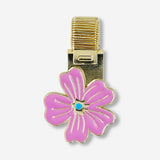 Gold pen loop with flower decoration from Flying Tiger Copenhagen, designed to attach to notebooks or planners for easy pen access.