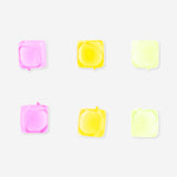 Six reusable ice cubes from Flying Tiger Copenhagen for keeping drinks cold, made of durable, non-toxic material.