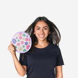 Foldable textile fan with abstract floral design by Flying Tiger Copenhagen, featuring vibrant colors and a compact, portable shape.