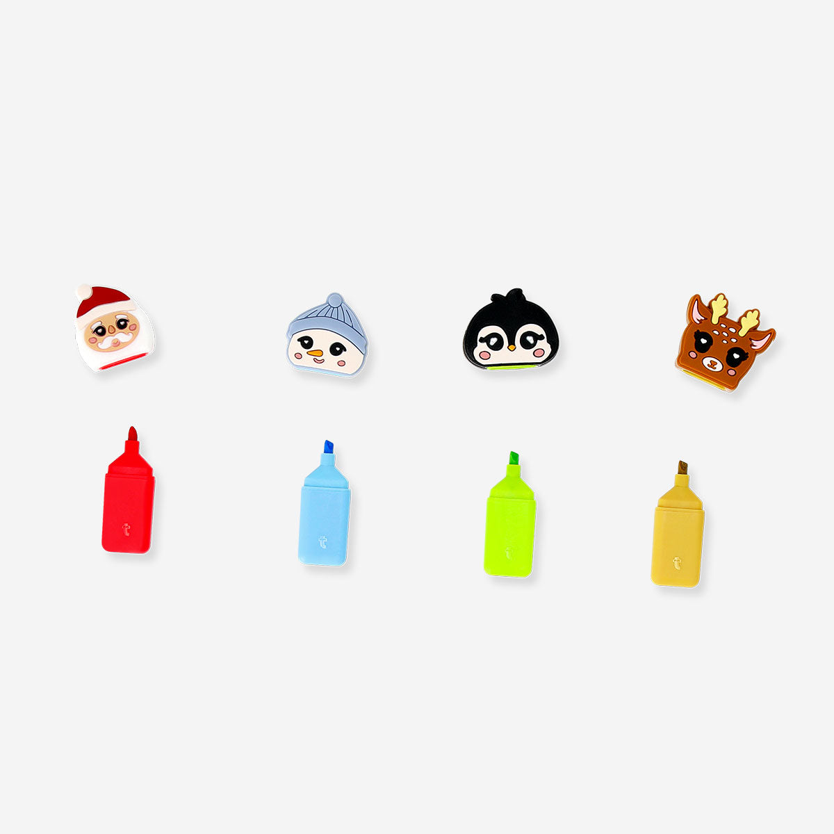 Set of four Christmas-themed highlighters from Flying Tiger Copenhagen, featuring festive colors and holiday designs for office use.
